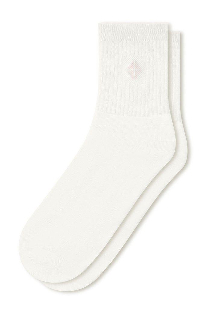 Adult Crew Socks in Cloud laying flat on a white background.
