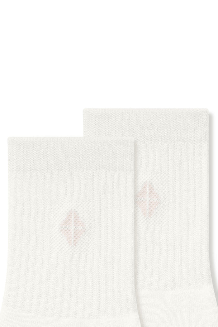 Close up adult Crew Socks in Cloud laying flat on a white background.