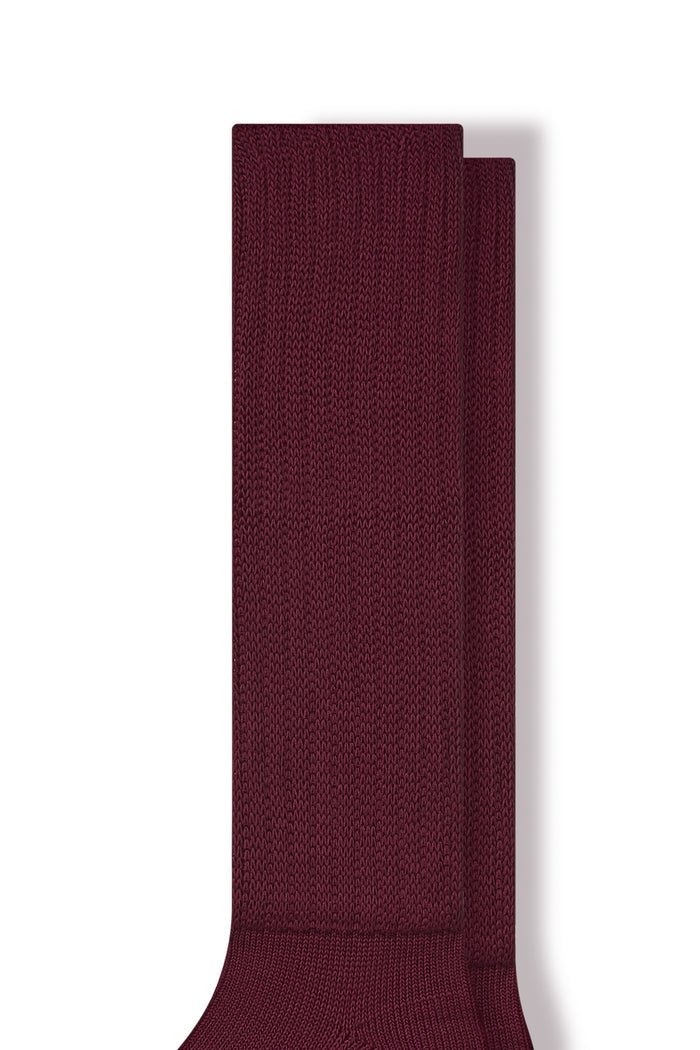 Adult Scrunch Socks in Burgundy close up on a white background.