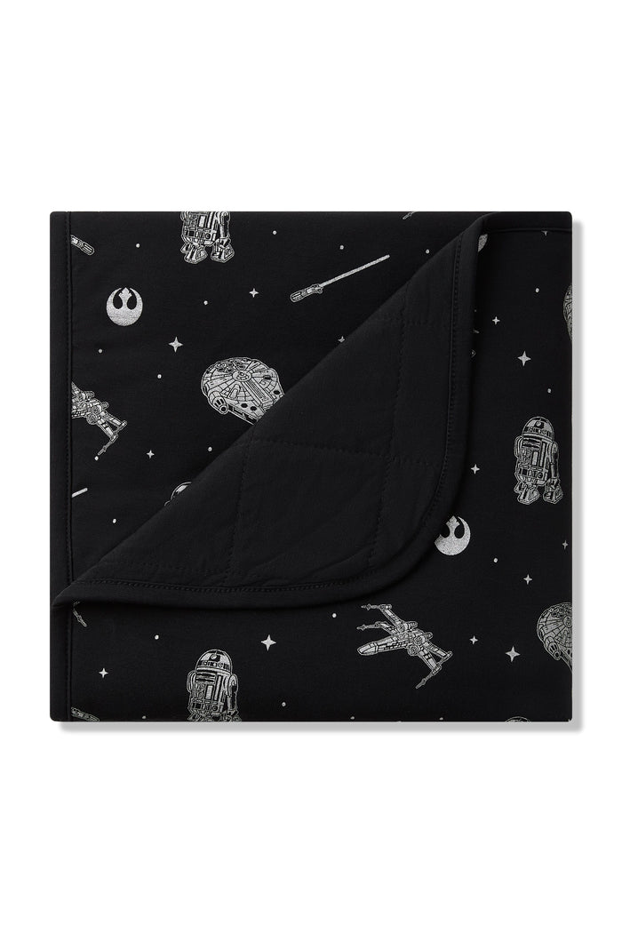 Baby Blanket in STAR WARS™ with the corner of the blanket folded down showing the black quilted backing