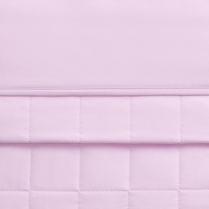 Close-up of a quilted purple blanket