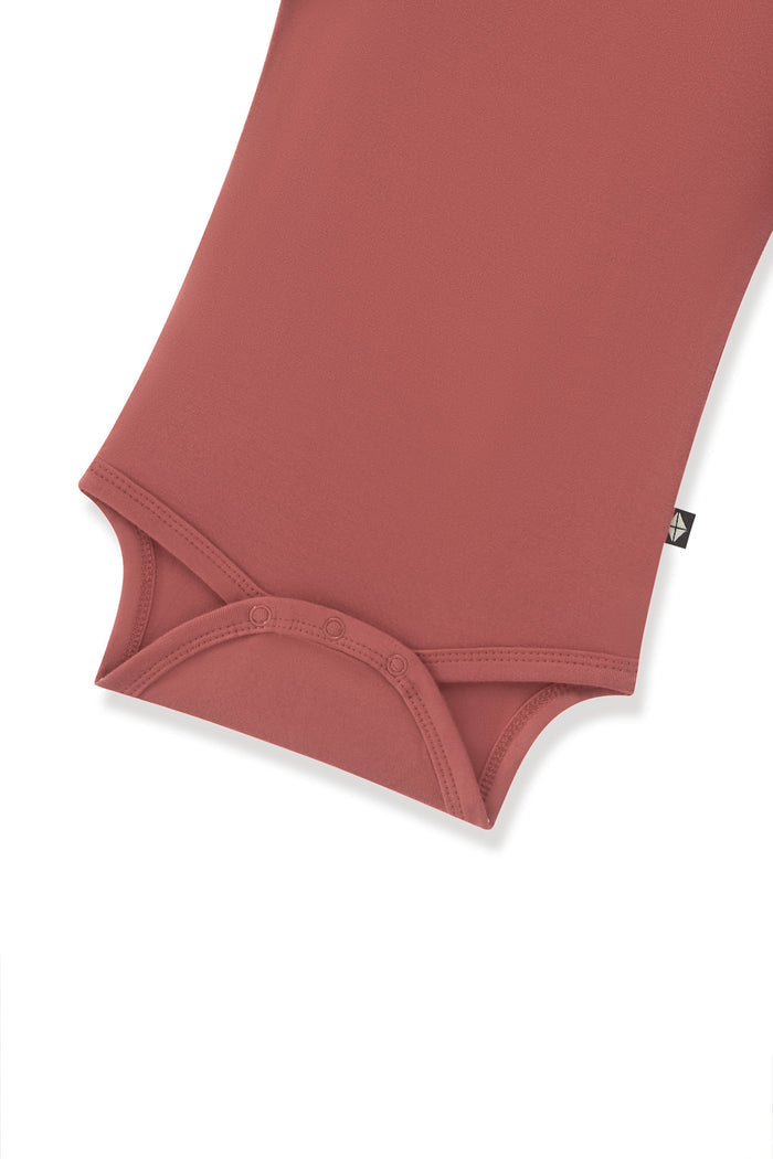 Ember Bodysuit with snap buttons on a white background