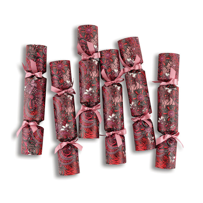 "Christmas Jewels" Luxury Candle Christmas Crackers Christmas crackers arranged on a festive table setting