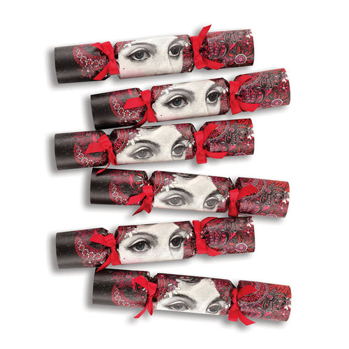 "Christmas Lady" Luxury Candle Christmas Crackers Christmas crackers arranged on a festive table setting