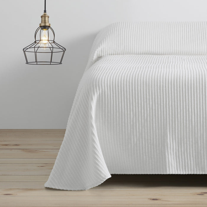 Colcha tejida Bali blanco escena de cama