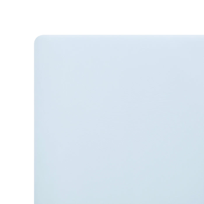 Corner of the Crib Sheet in Breeze shown on a crib mattress