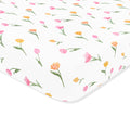 Close up of the Crib Sheet in Tulip shown on a crib mattress