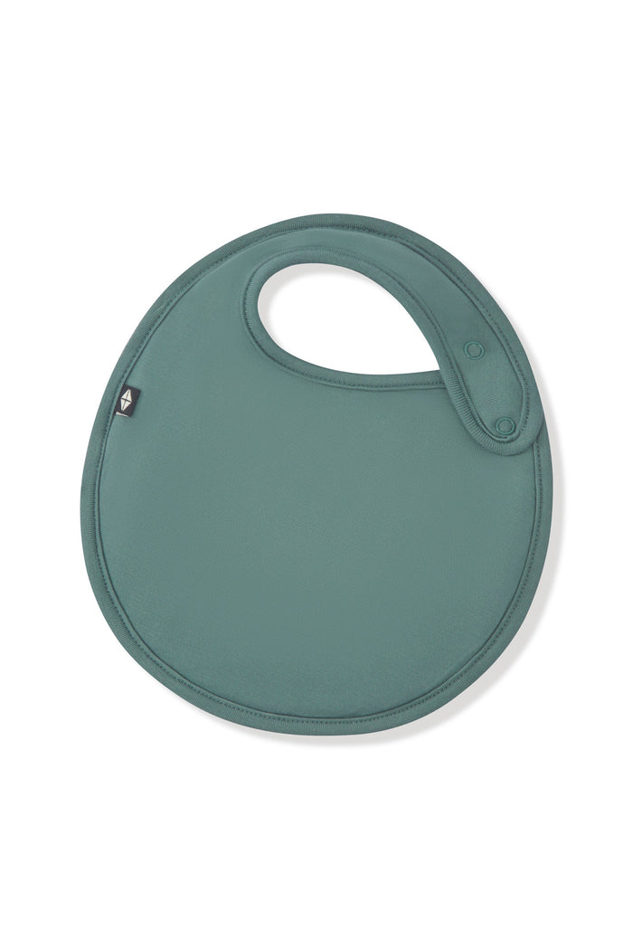 Front side of the Cushy Bib in Pine showing the snap closures on a white background