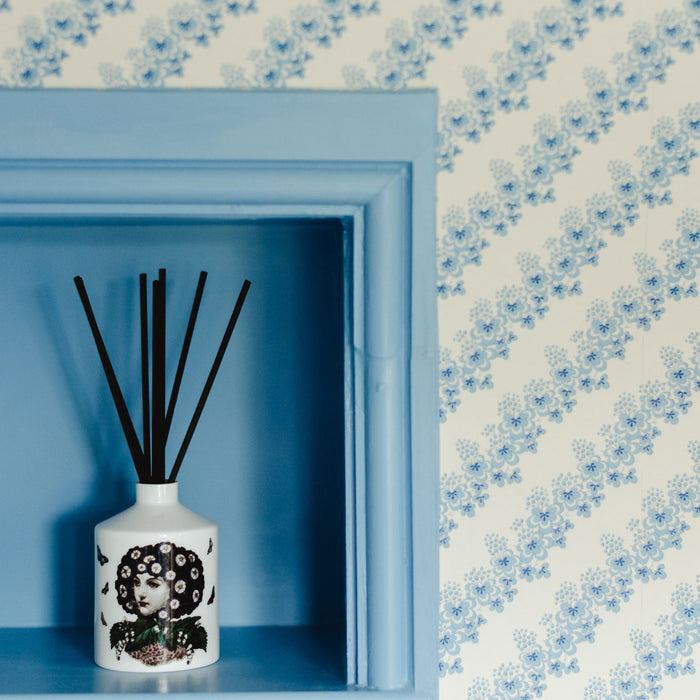 Eden ceramic reed diffuser, close-up of the hand-decorated illustration and 22ct gold
