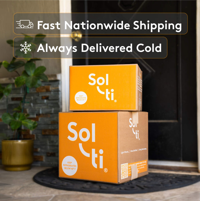 Two Sol-ti boxes stacked outside a door with text about fast nationwide shipping and cold delivery.