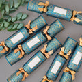 "Golden Ivy" Place Name Luxury Christmas Crackers by Chase and Wonder, hand-rolled luxury crackers with illustrated design
