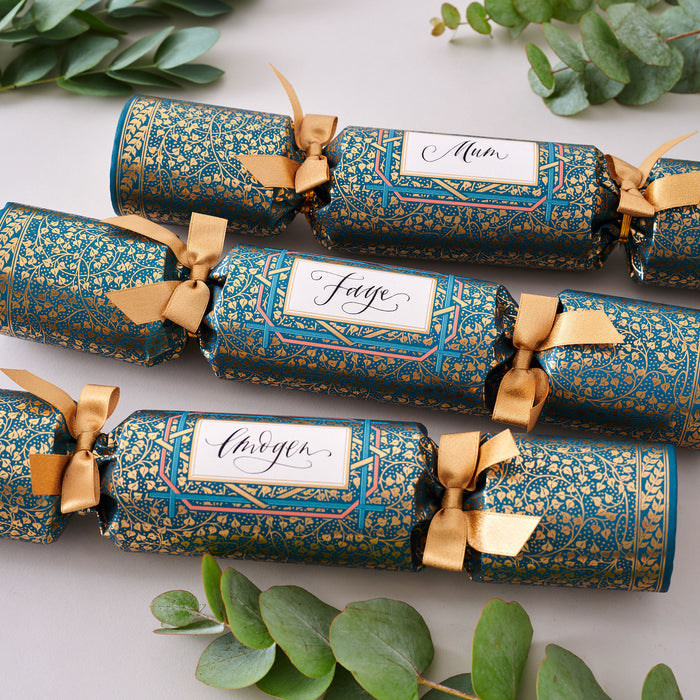 "Golden Ivy" Place Name Luxury Christmas Crackers Christmas crackers arranged on a festive table setting