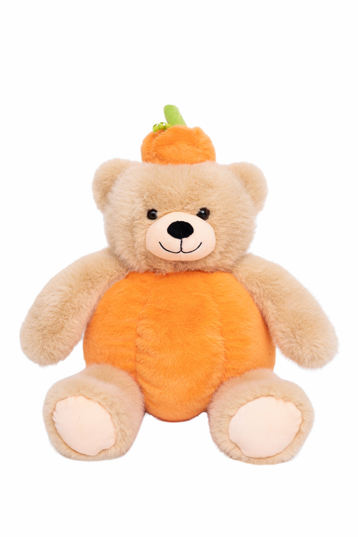 A plush teddy bear dressed as a pumpkin, featuring a beige body, a bright orange pumpkin-shaped belly, and a small orange hat with a green stem, set against a plain white background.