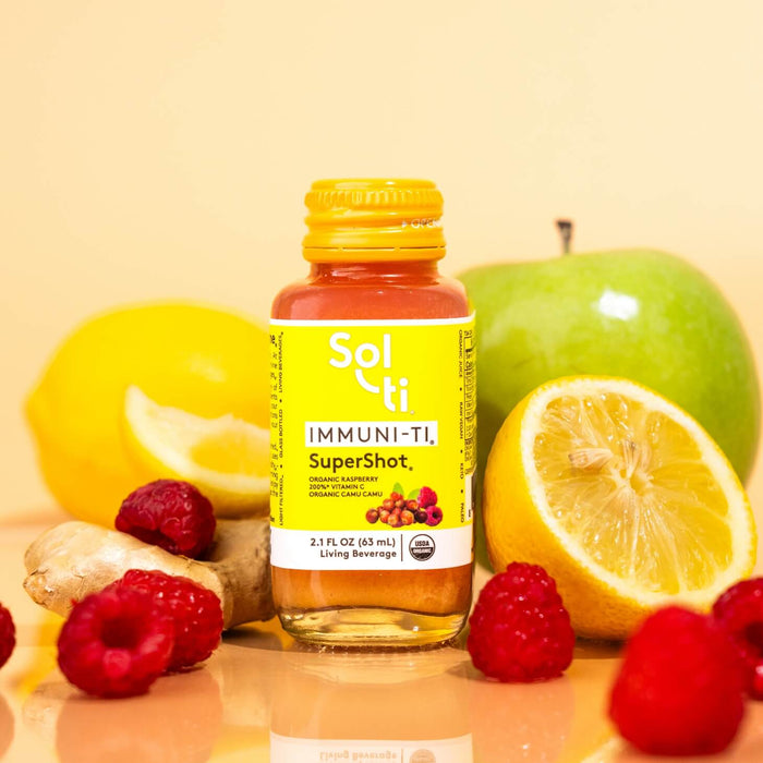 IIMMUNI-TI SuperShot glass bottle front label with raspberries, green apples, and lemon slices