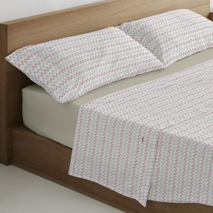 Juego de sábanas estampado Cloe rosa escena de cama
