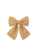 Large Alligator Clip Bow in Ochre on a white background