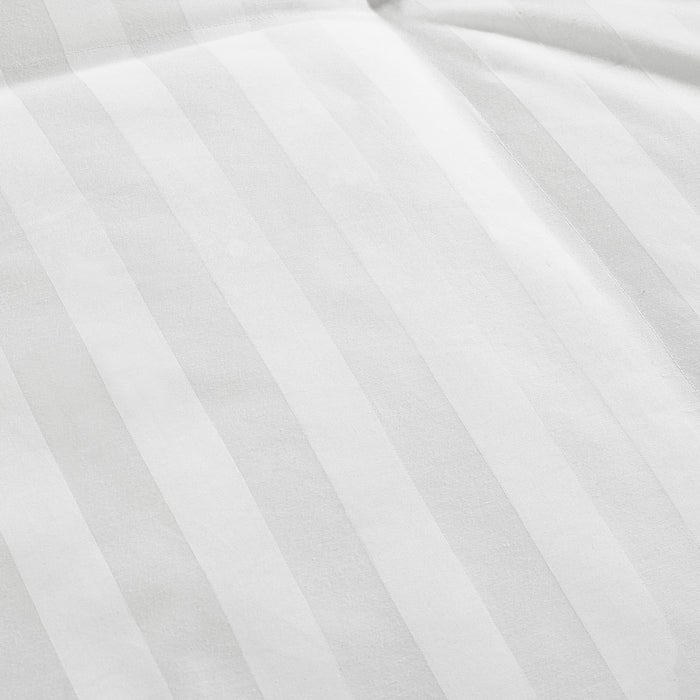 A close up image of a Live Comfortably White Duck Down Comforter with white stripes from Hollander.
