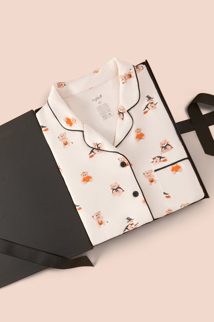 Long-Sleeved Women's Pajama Set in Halloween Teddy print packed in a box on a beige background