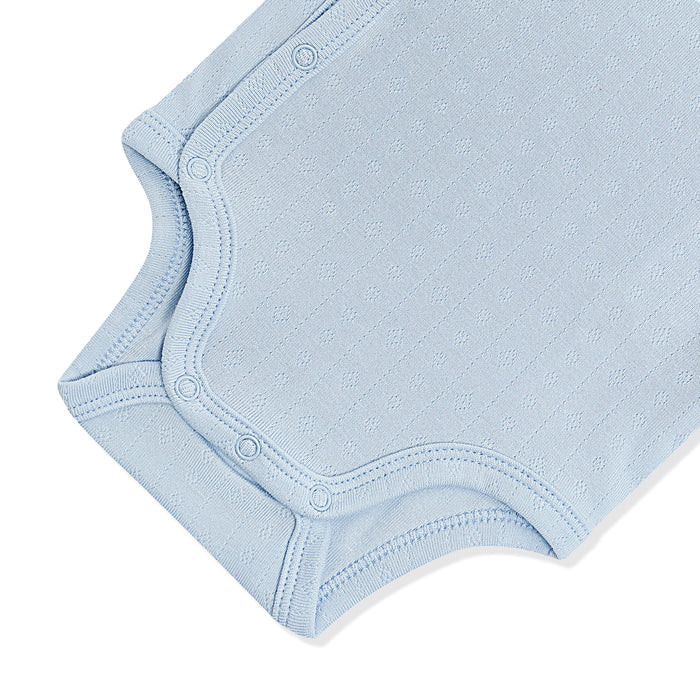 Close up of the inseam snap closure on the Pointelle Kimono Bodysuit in Breeze