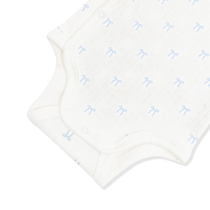 Close up of the snap closure on the inseam shown on the Pointelle Kimono Bodysuit in Sweet Blue Bow