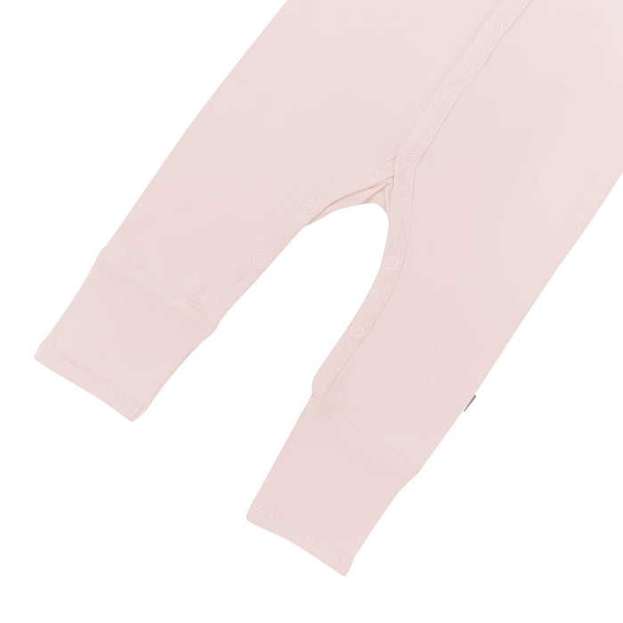 Close up of snaps and legs on  Kyte Baby  Romper in Blush