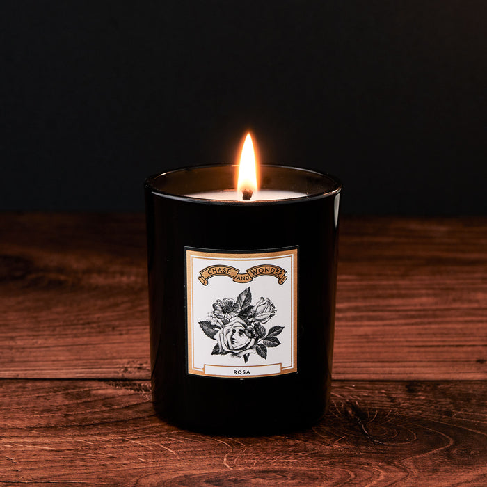 Rosa Luxury Scented Glass Candle by Chase and Wonder, elegant black glass vessel with gold lid