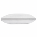 The Keeco Serta Dream Loft Pillow, showcased in a side view, is white and rectangular with a subtly quilted, textured surface. It features a horizontal grey stripe running across the center. Crafted from hypoallergenic SupraLoft premium fiber, the super soft seersucker fabric guarantees ultimate comfort. The background is plain white.
