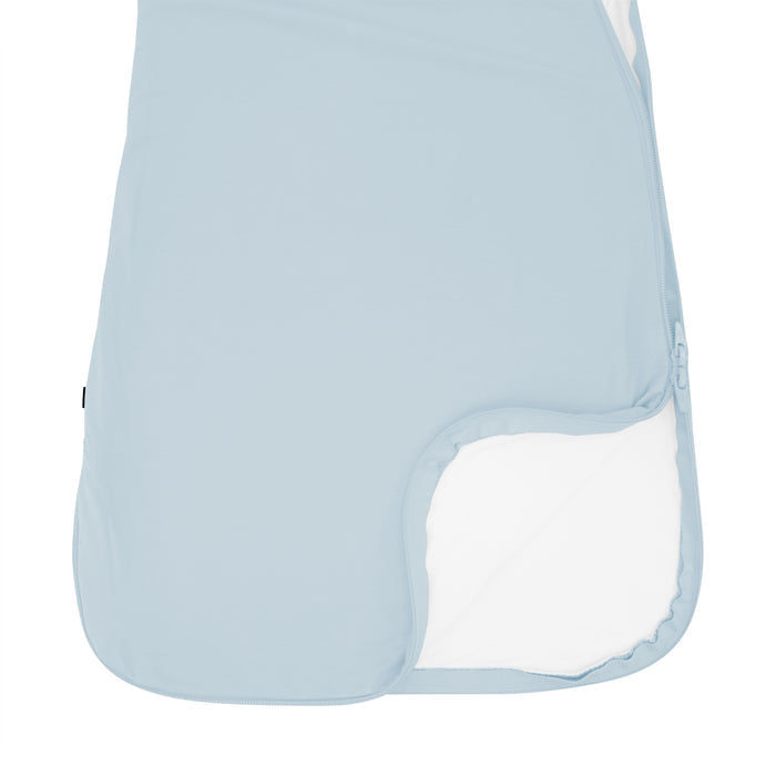 Close up of  unzipped dual zipper on Kyte Baby Sleep Bag in 0.5 TOG