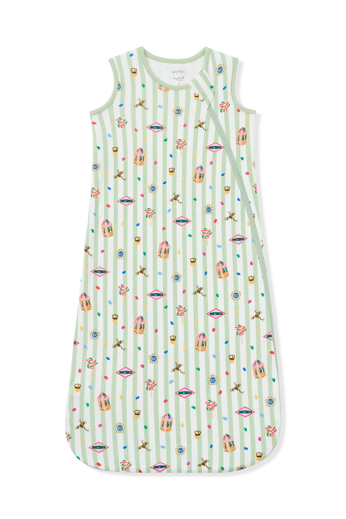 Sleep bag with green and white striped fabric with colorful Harry Potter patterns on a white background