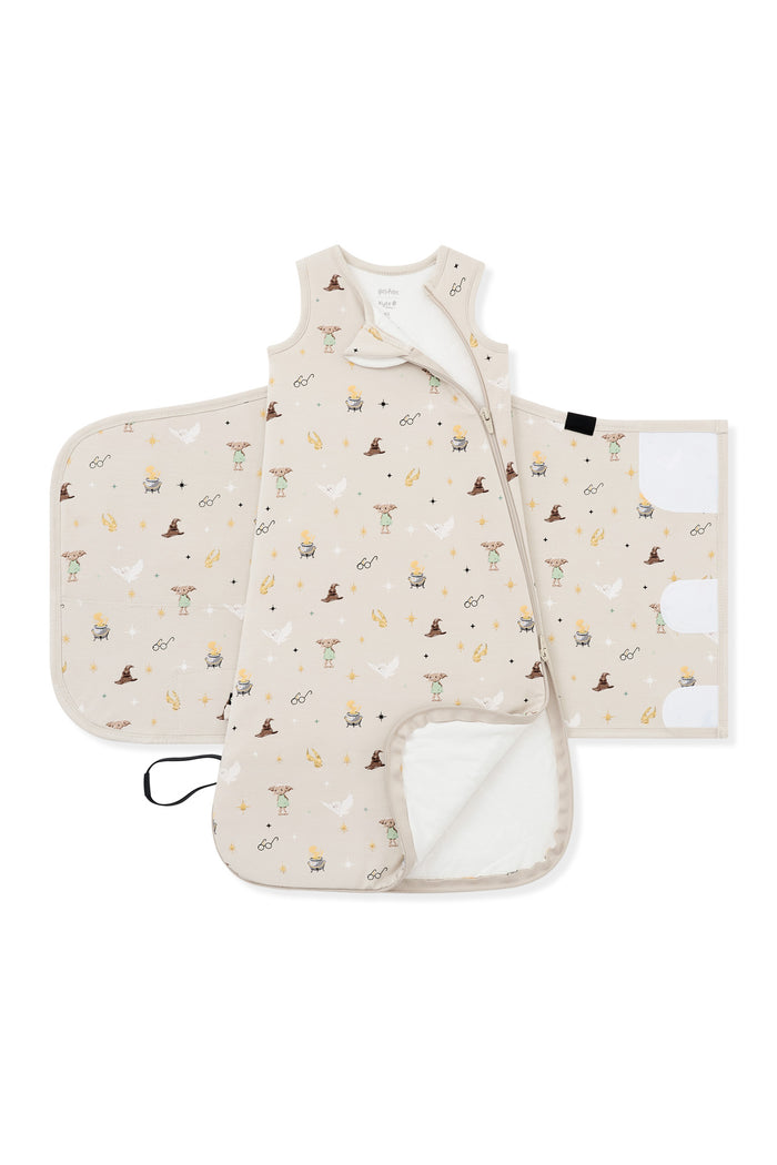 Double zipper shown on an unswaddled Beige Sleep Bag Swaddler in Harry potter print 1.0 on a white background