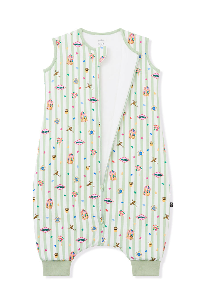 Open zipper of Sleep bag walker in Green and white striped fabric with colorful Harry Potter pattern print on a white background