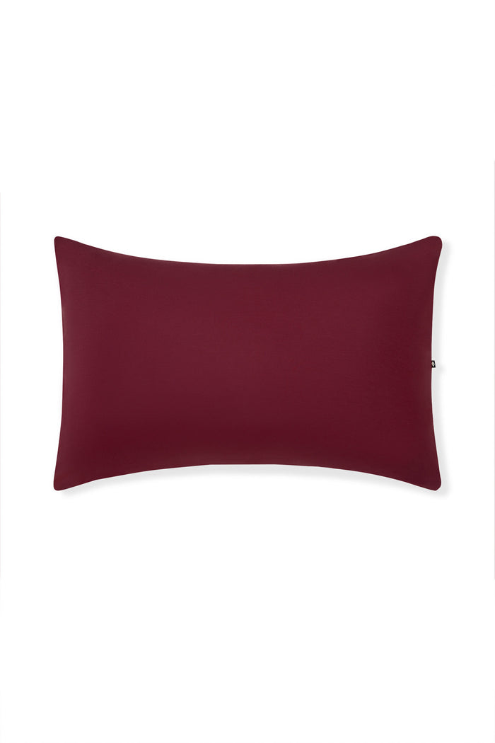 Front Side Standard Pillowcase in Burgundy on a white background