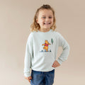 Young child modeling the Sweatshirt in Winnie the Pooh on Dew with one hand on their hip