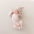 Sleeping infant in Take Me Home Set with Cap in Blush