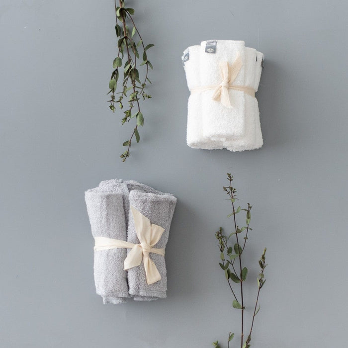 Kyte Baby bamboo Terry Washcloth sets in Storm gray and Cloud white