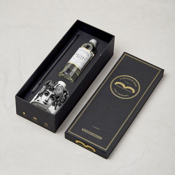 The Autumn Rose ceramic reed diffuser, close-up of the hand-decorated illustration and 22ct gold