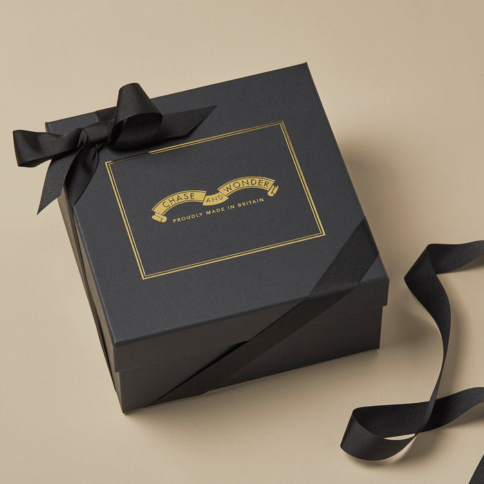 The Favourites Discovery Candle Set gift set, contents displayed alongside the luxury gift box