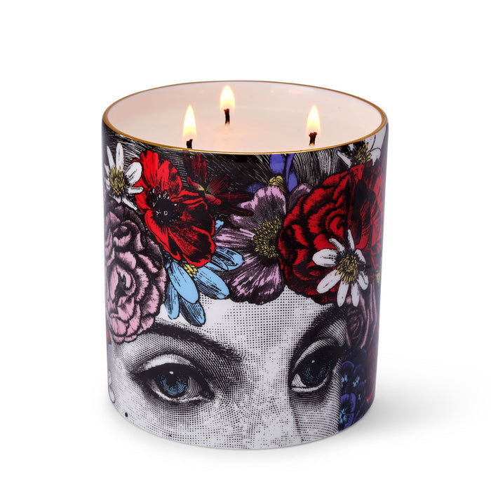 The Flower Lady 3 Wick Special Edition ceramic candle lit, showing the warm glow of the flame in the fine china vessel