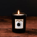 The Land of Nod Luxury Glass Candle by Chase and Wonder, elegant black glass vessel with gold lid