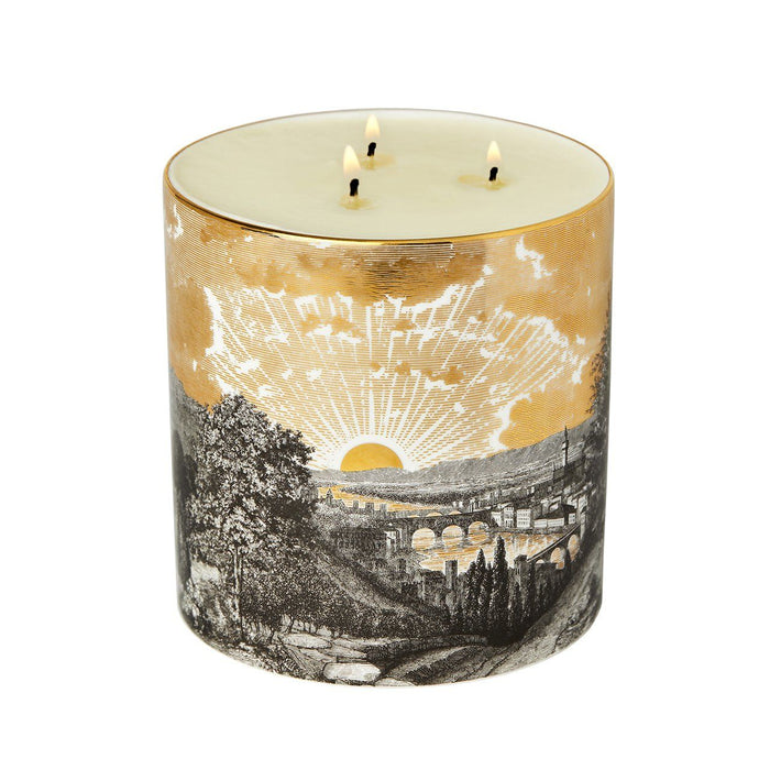 The Tuscan Sunset 3 Wick Scented ceramic candle lit, showing the warm glow of the flame in the fine china vessel