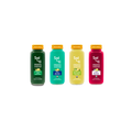 Four glass SuperAde bottles: Chlorophyll Aloe, Blue Spirulina, Lemon Lime & Wild Blueberry