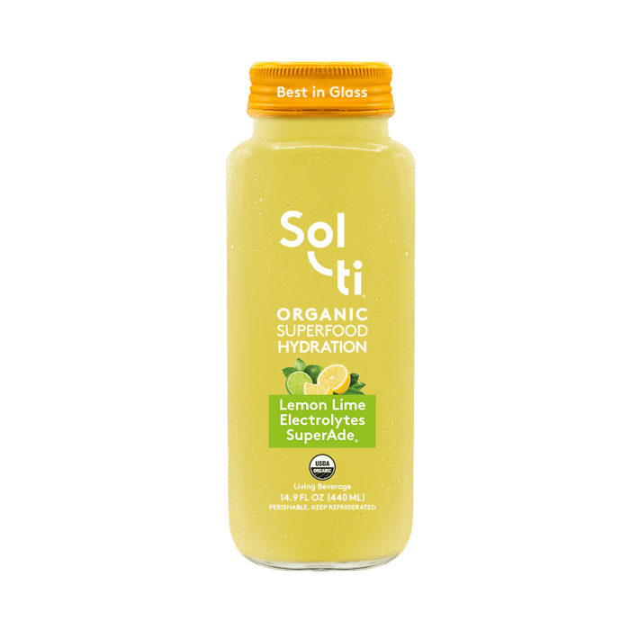 Sol-ti Lemon Lime SuperAde glass bottle with a transparent front label, in  a light background.