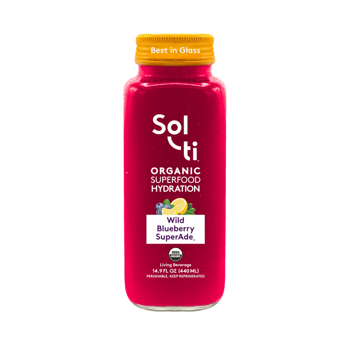 Sol-ti Wild Blueberry SuperAde glass bottle with a transparent front label, in  light background.