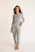 Modal wearing Women's Jogger Pajama Set in Bats print on a white background