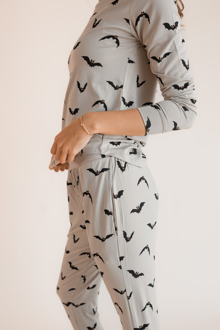 Close up of Modal wearing Women's Jogger Pajama Set in Bats print on a white background