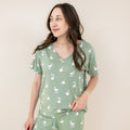 Close up of the Women's Relaxed Fit V-Neck in Silly Goose shown on a female model