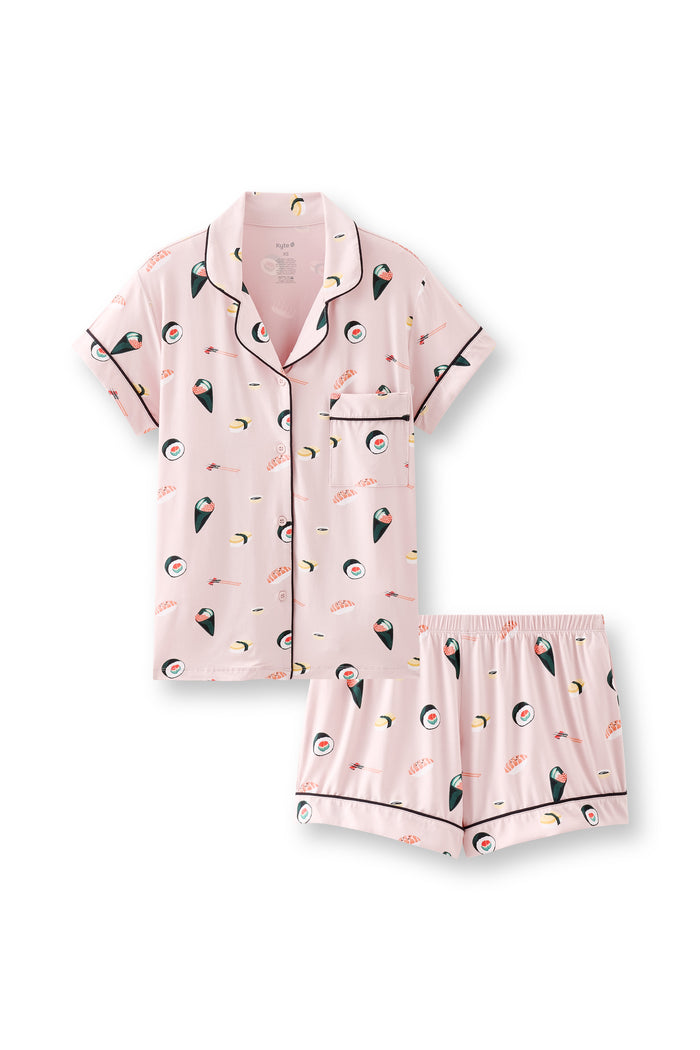 Pink Women's Short Sleeve Pajama Set with Sushi pattern on a white background
