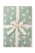 Youth Blanket in Koala 2.5 shown wrapped in a linen bow