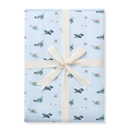 Youth Blanket in Take Off 1.0 shown wrapped in its packaging tied with a linen bow