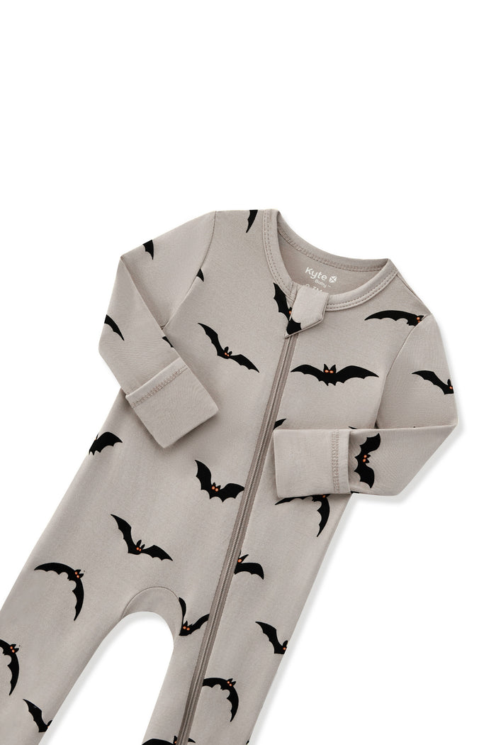 Zippered Romper in Bats print with zipper garage on a white background